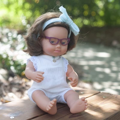 Miniland 15" Girl Doll With Down Syndrome And Glasses With Outfit 5 Miniland 15" Girl Doll With Down Syndrome And Glasses With Outfit - Image 3